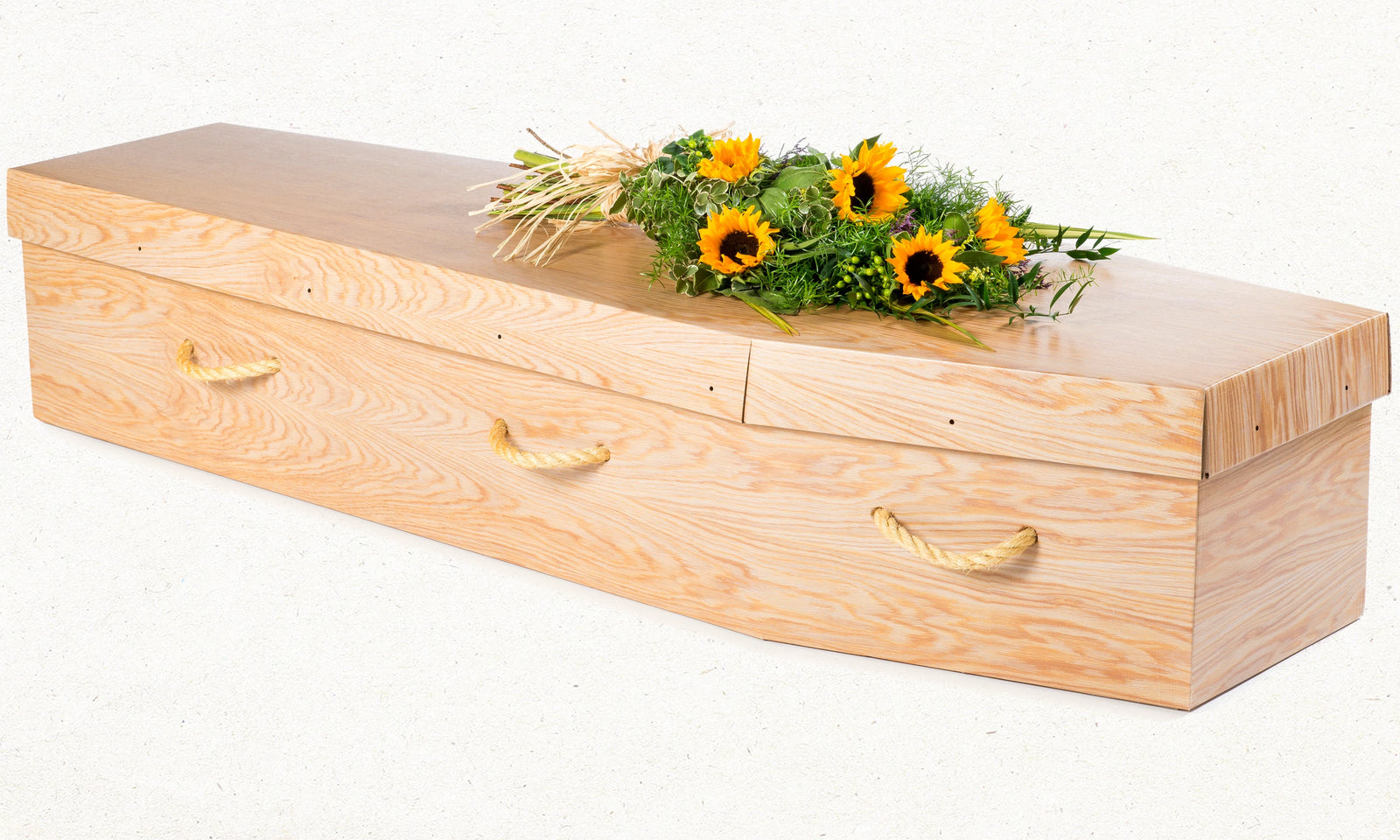 Picture of cardboard coffin with woodgrain design