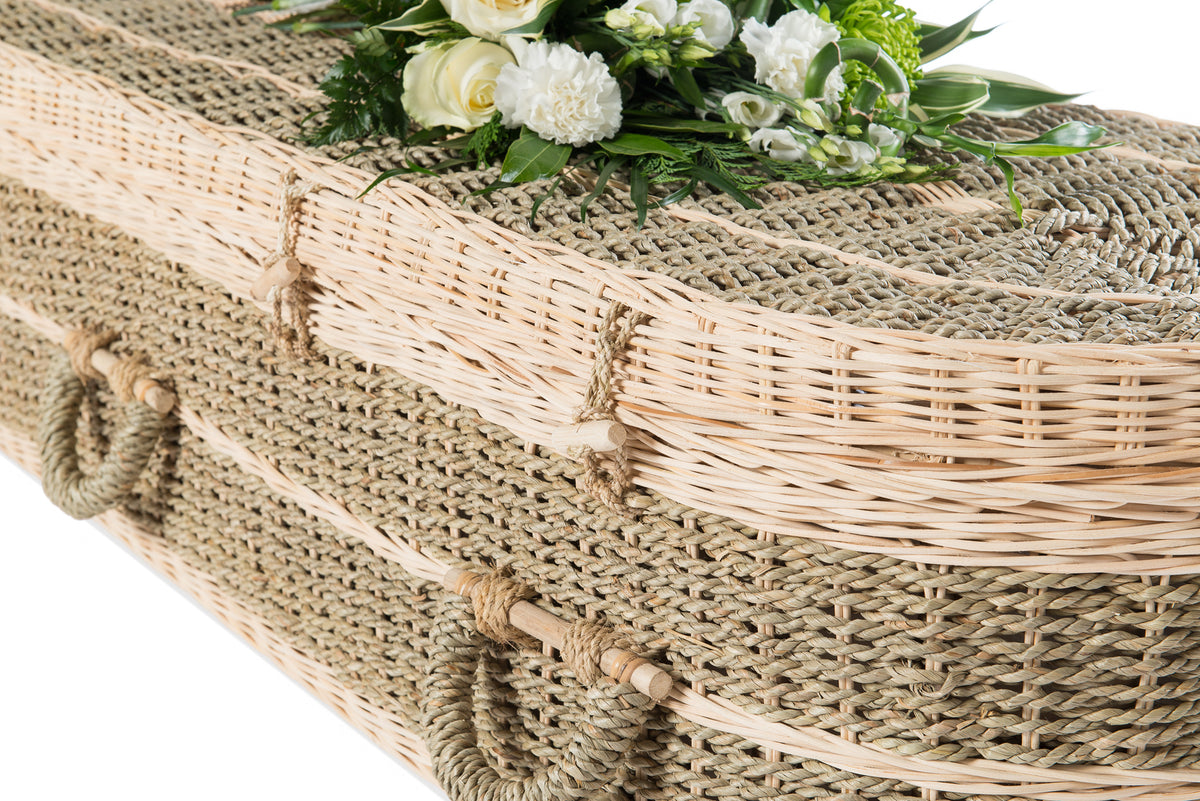 Close up picture of an Ecoffins Pandanus Round coffin on a white background