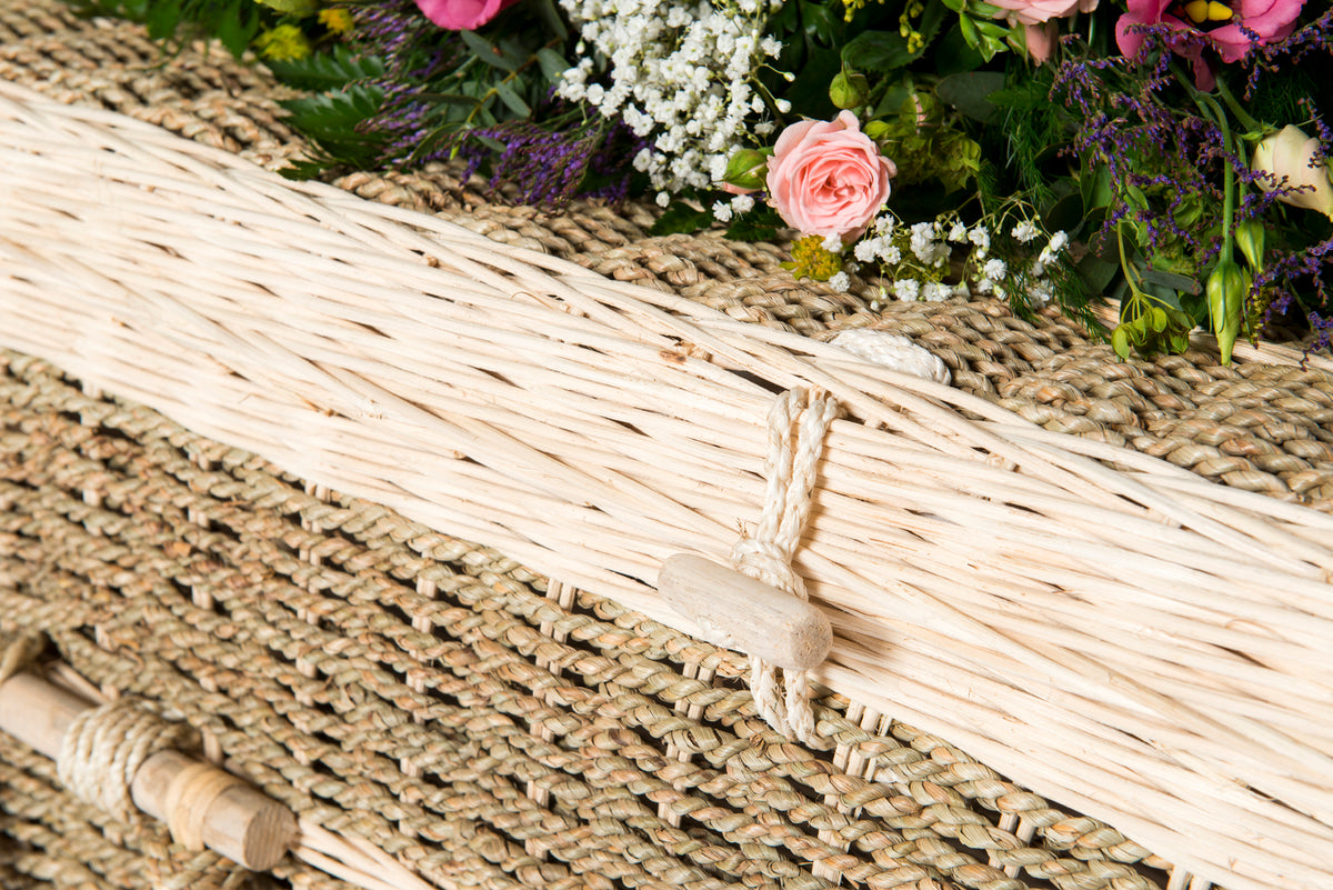 Close up of an Ecoffins Pandanus Traditional lid fastening toggle and weave