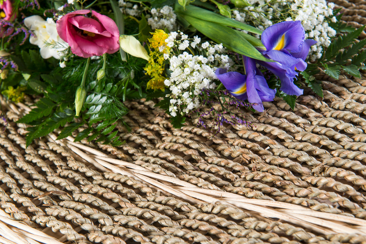 weave on an Ecoffins Pandanus Traditional lid with flowers